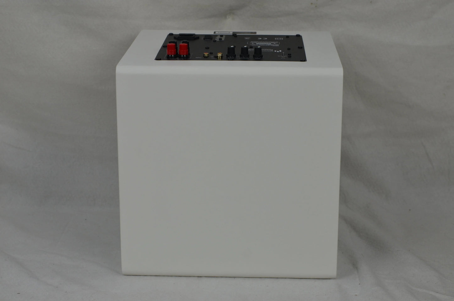 Bravus II 10D Subwoofer laying on it's side showing the top of it.