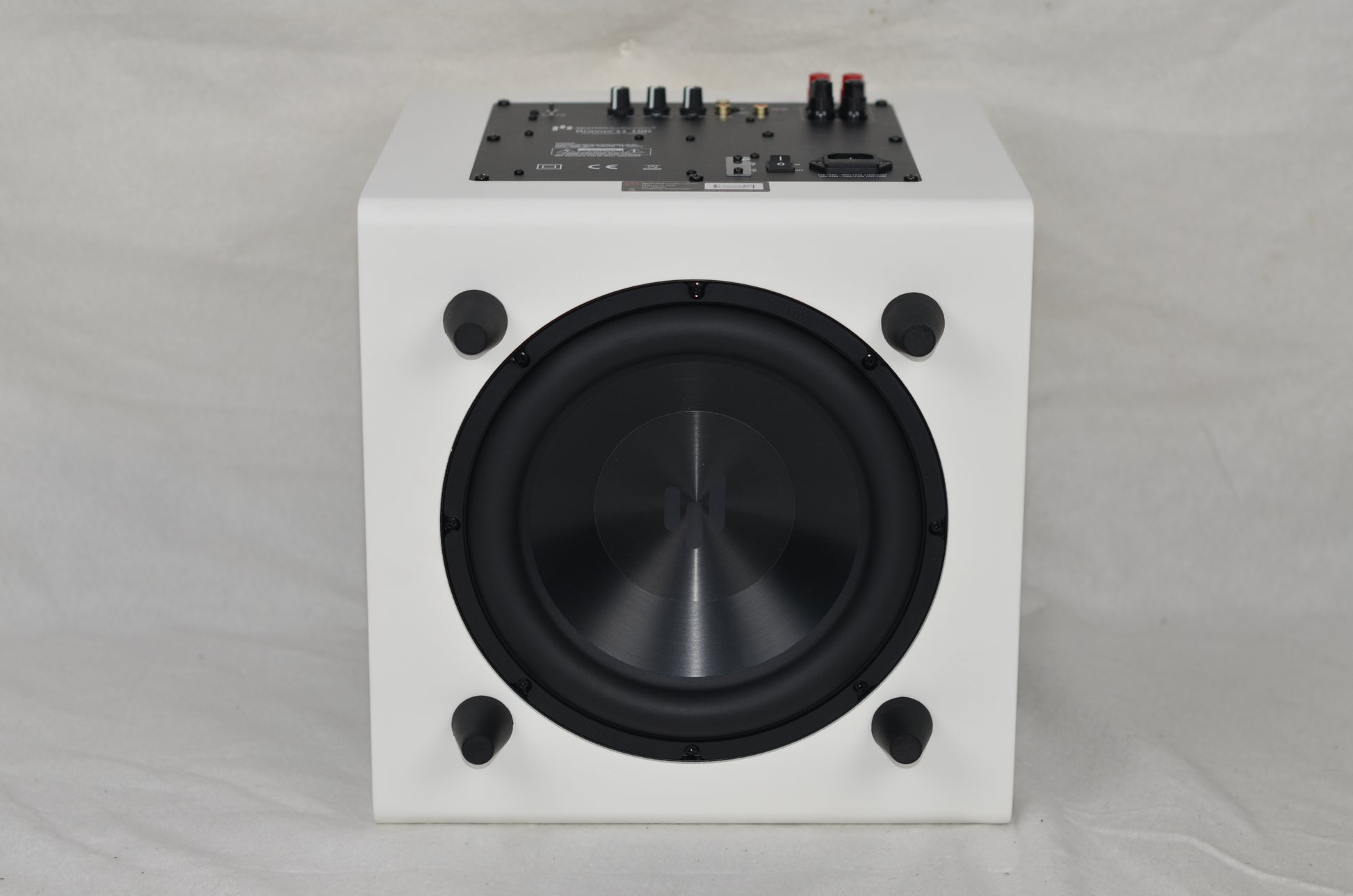 Bravus II 10D Subwoofer laying on it's front to show the down firing active woofer.
